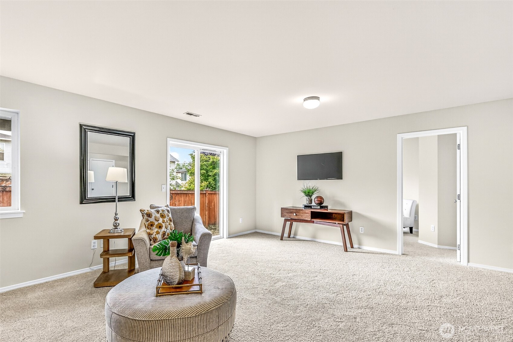 3918 152nd Place Southeast Bothell, WA 98012 - Photo 20 of 31 a living room with furniture and a large window