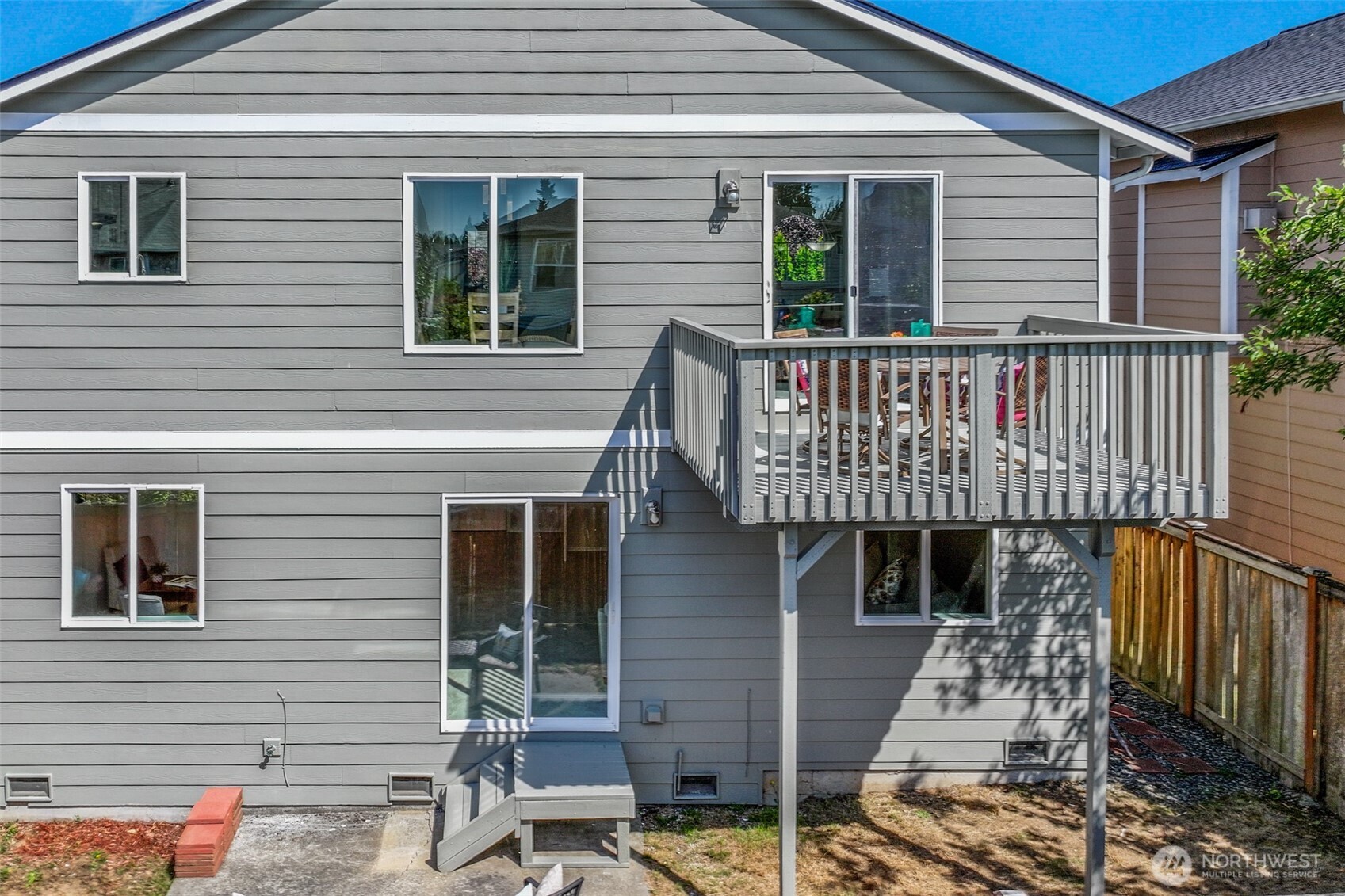 3918 152nd Place Southeast Bothell, WA 98012 - Photo 26 of 31 a view of a house with wooden door and furniture