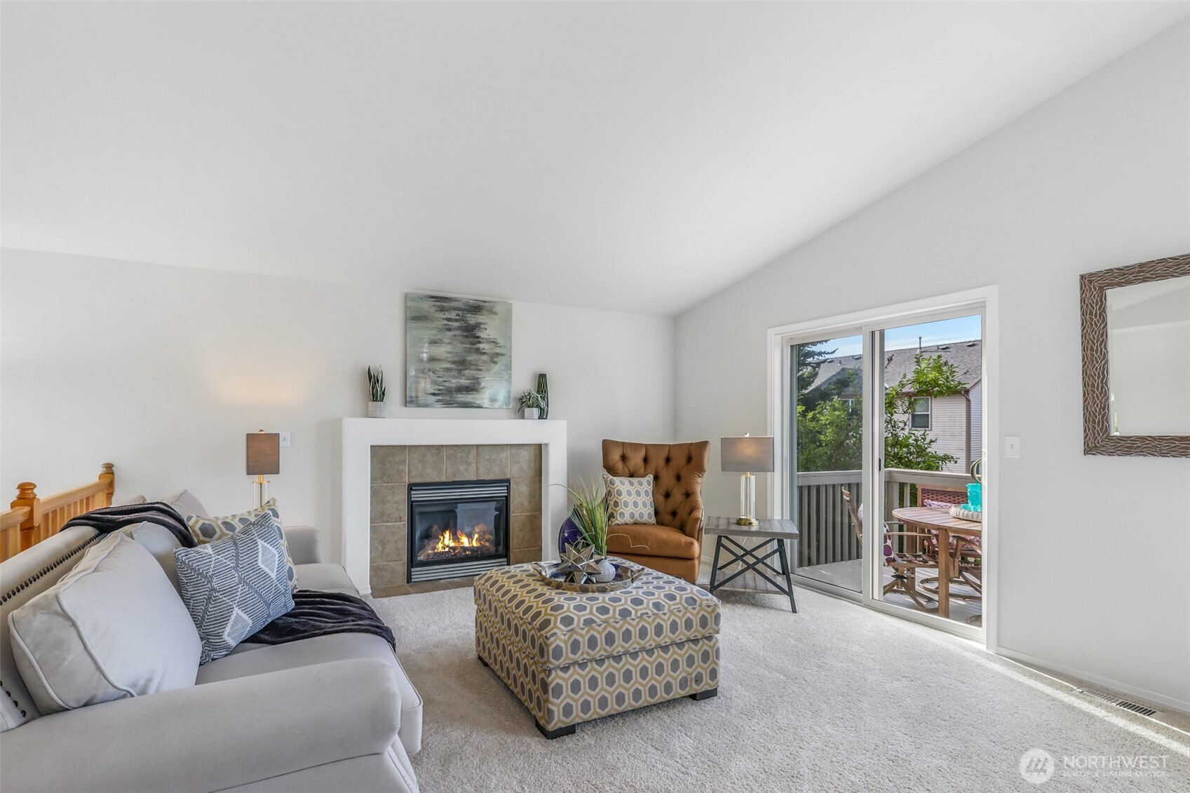 3918 152nd Place Southeast Bothell, WA 98012 - Photo 3 of 31 a living room with furniture and a fireplace