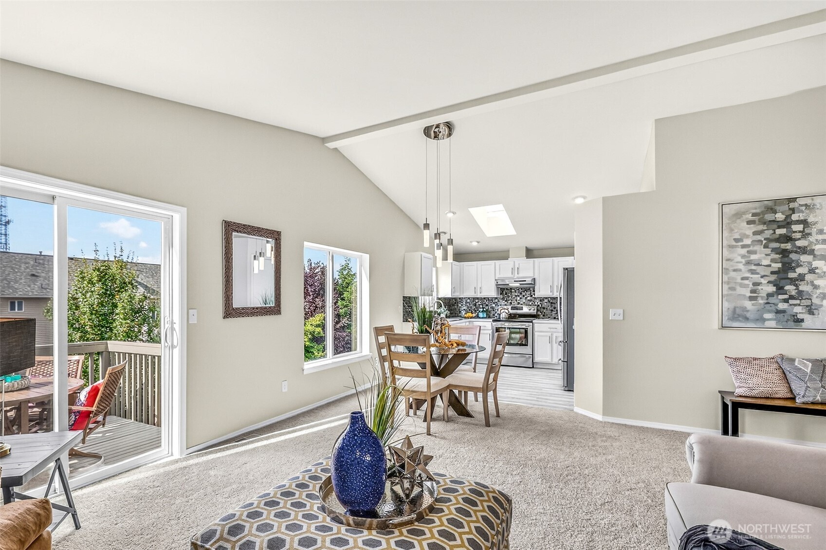 3918 152nd Place Southeast Bothell, WA 98012 - Photo 5 of 31 a living room with furniture a bed and a window