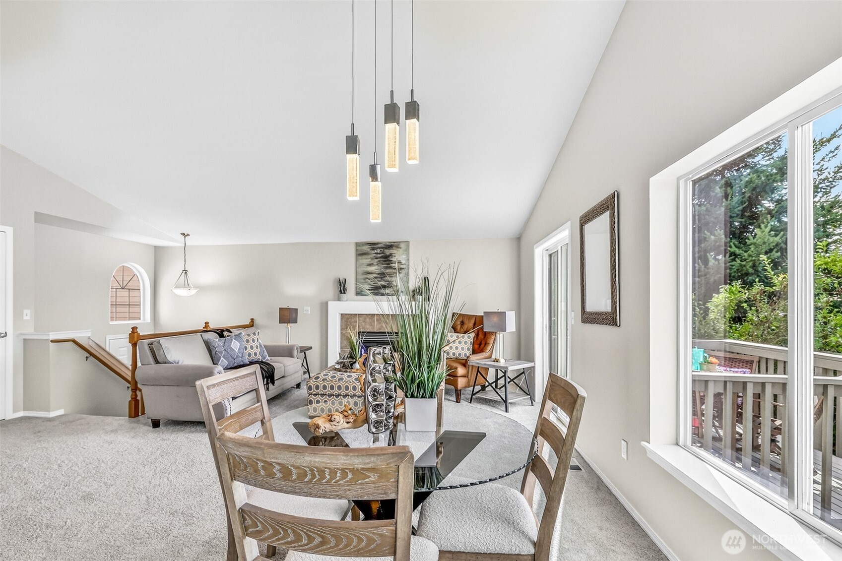 3918 152nd Place Southeast Bothell, WA 98012 - Photo 7 of 31 a living room with furniture and a large window