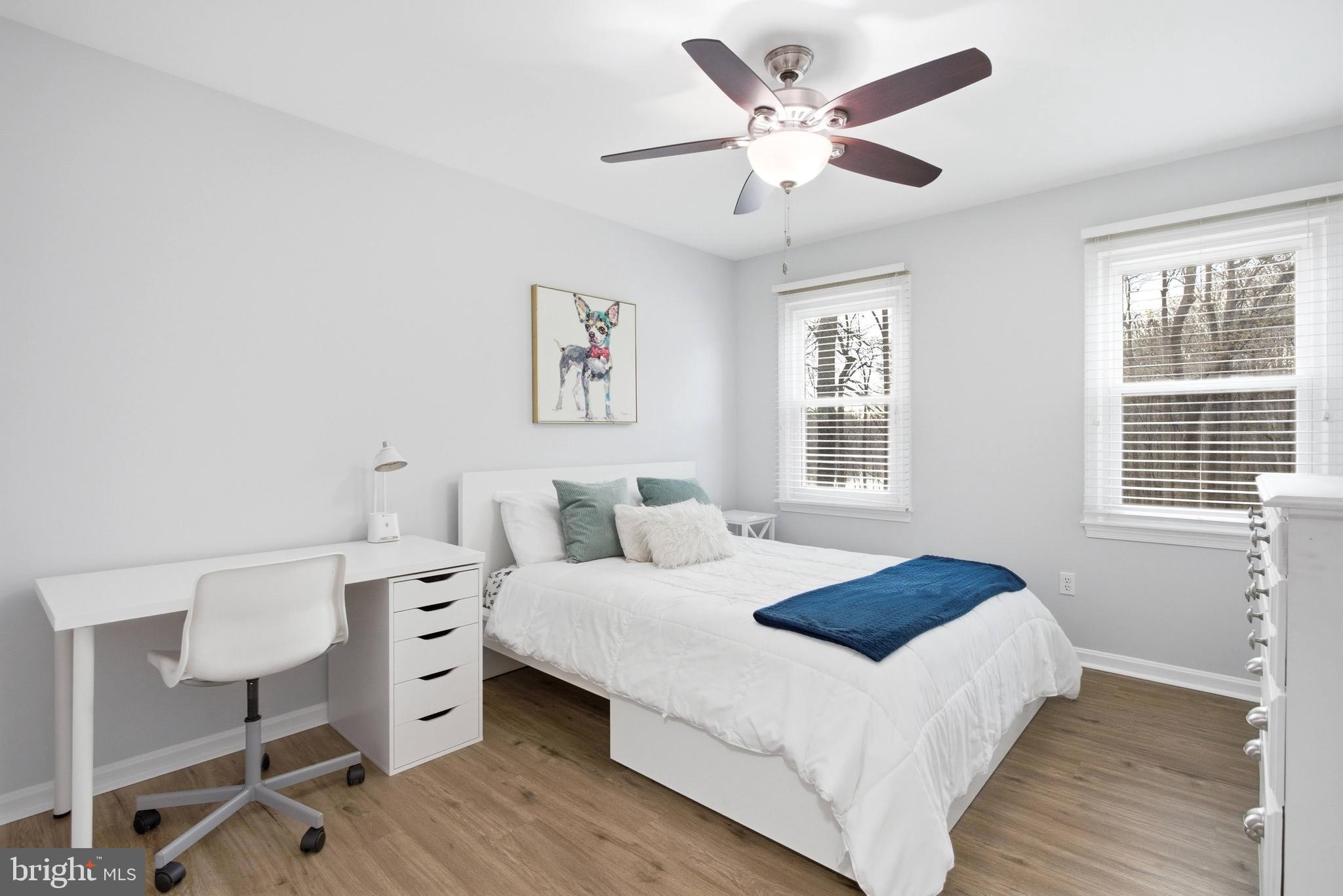 7400 Dorothy Court Springfield, VA 22153 - Photo 20 of 54 a bedroom with a bed chandelier and a window