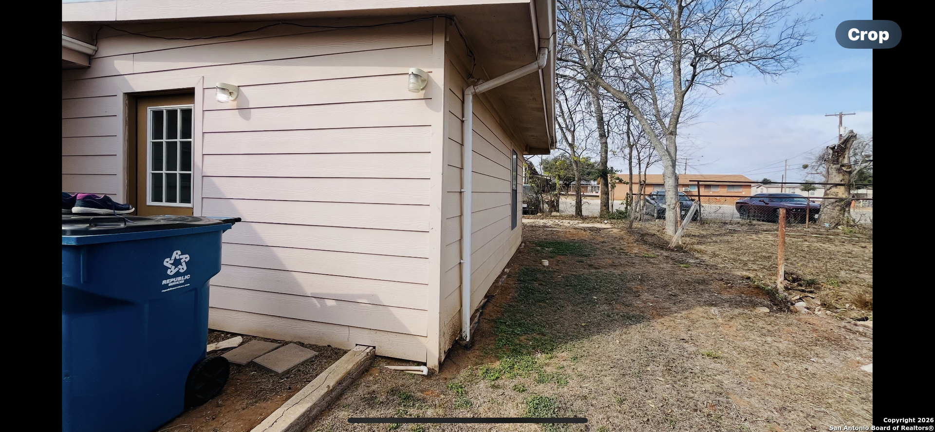 200 West Frio Street Dilley, TX 78017 - Photo 18 of 18 a view of a house with a door