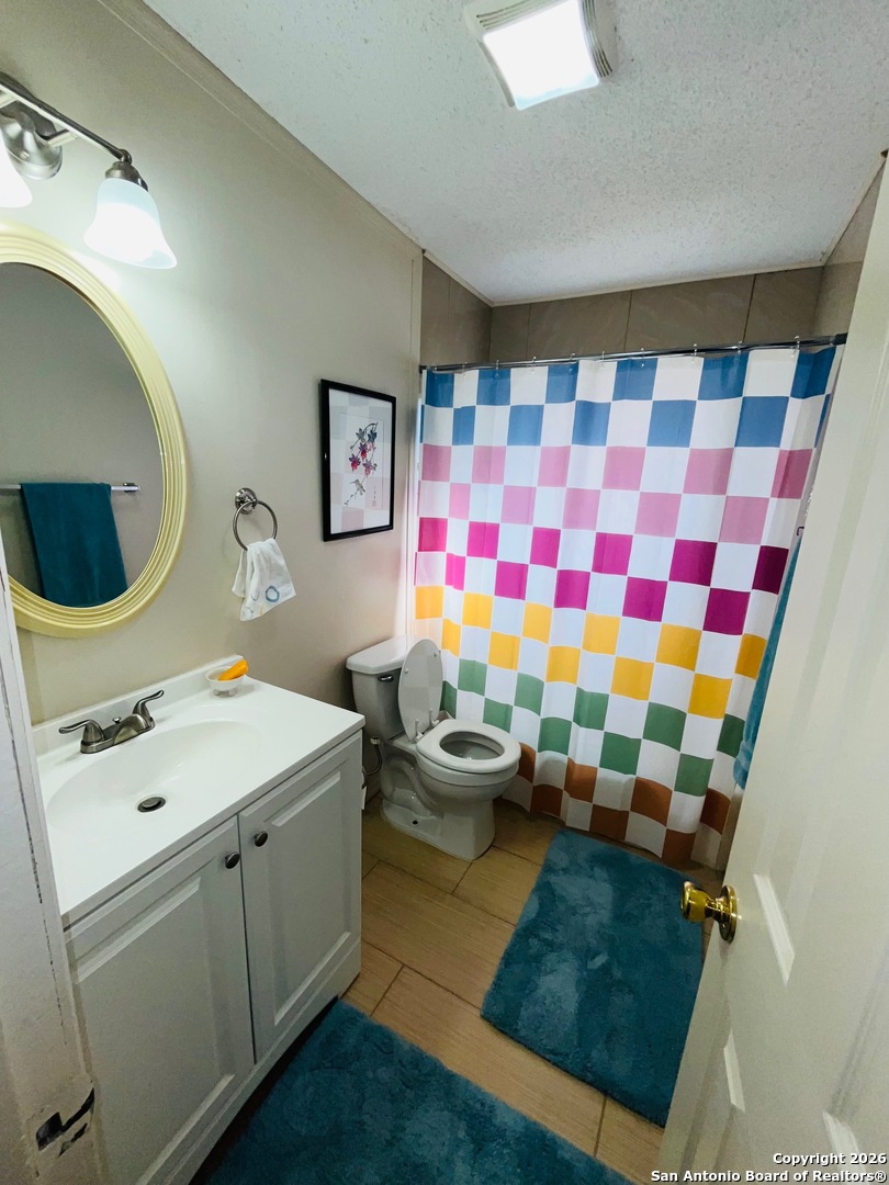 200 West Frio Street Dilley, TX 78017 - Photo 7 of 18 a utility room with dryer and washer