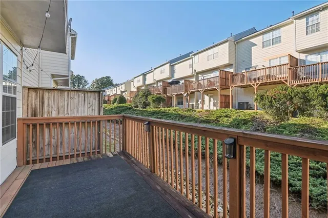 a view of a street from a balcony