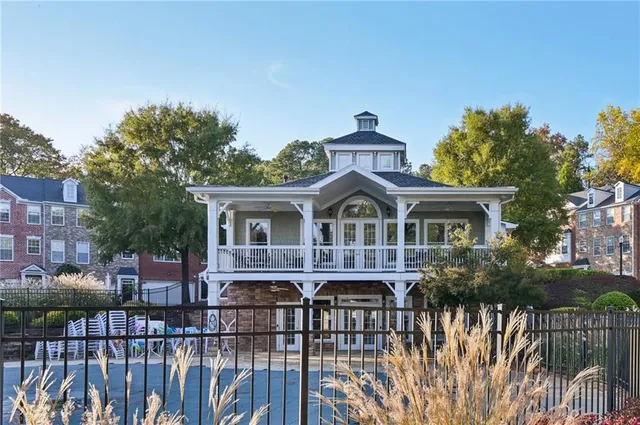 a front view of a house with a porch