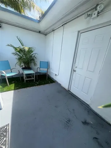 a potted plant sitting in front of a window