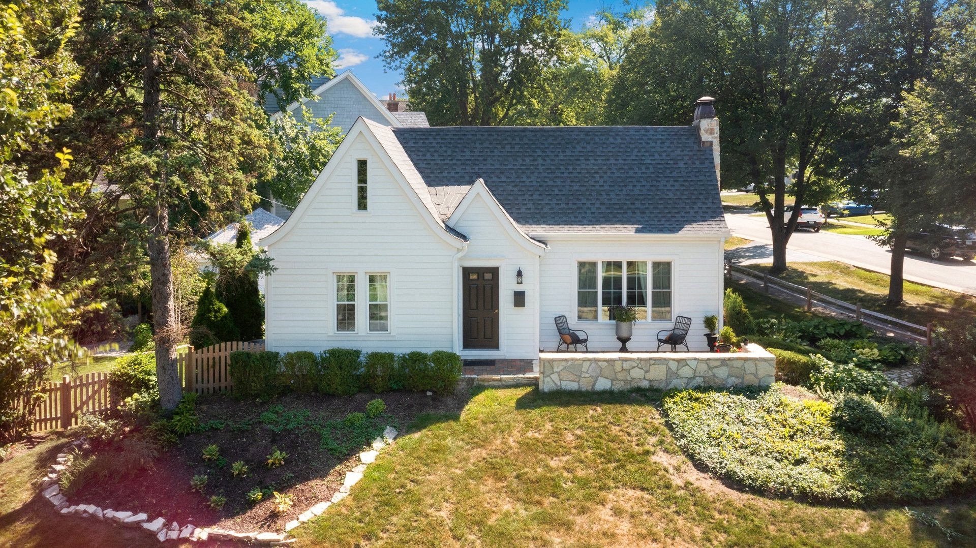 a front view of a house with garden