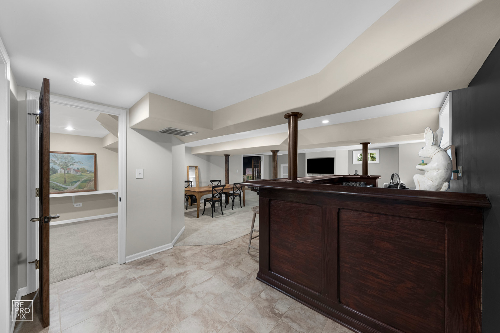 352 Ridge Avenue Clarendon Hills, IL 60514 - Photo 18 of 31 a kitchen with lots of counter top space and dining table