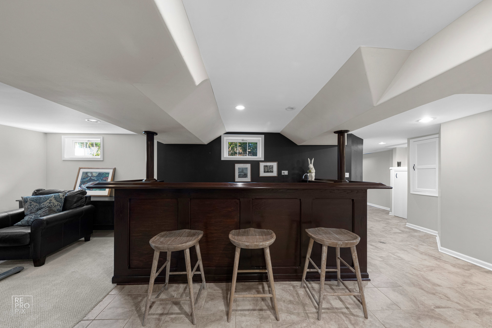352 Ridge Avenue Clarendon Hills, IL 60514 - Photo 19 of 31 a kitchen with a dining table chairs and a refrigerator