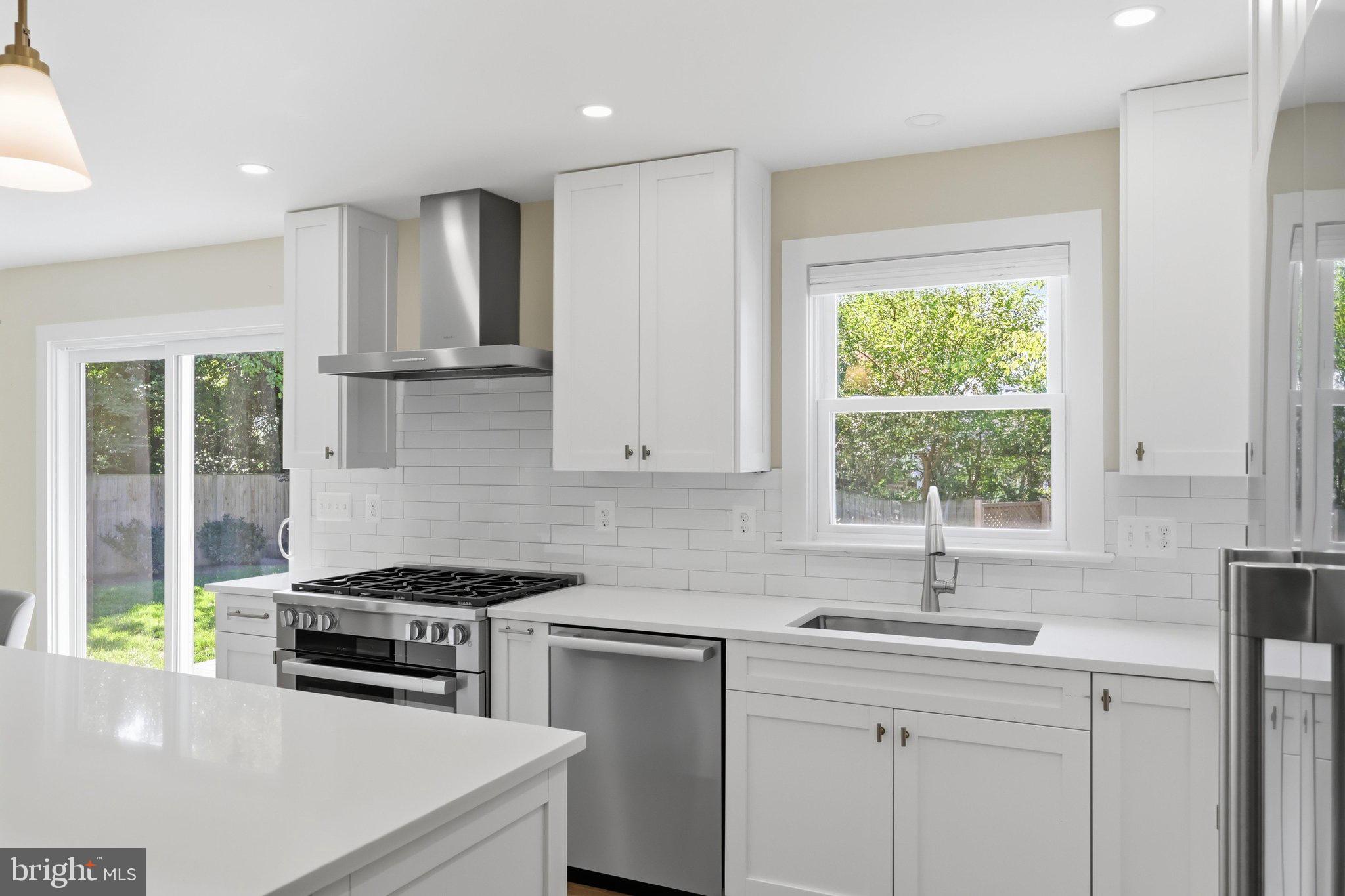 1003 Collingwood Road Alexandria, VA 22308 - Photo 11 of 66 Miele six-burner range & range hood