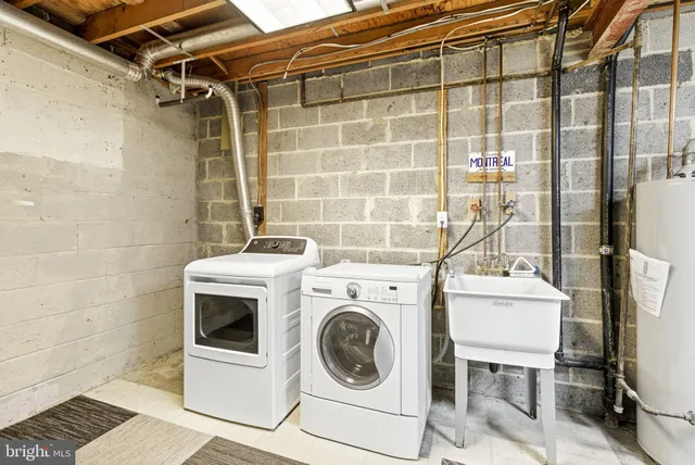 a utility room with dryer and washer