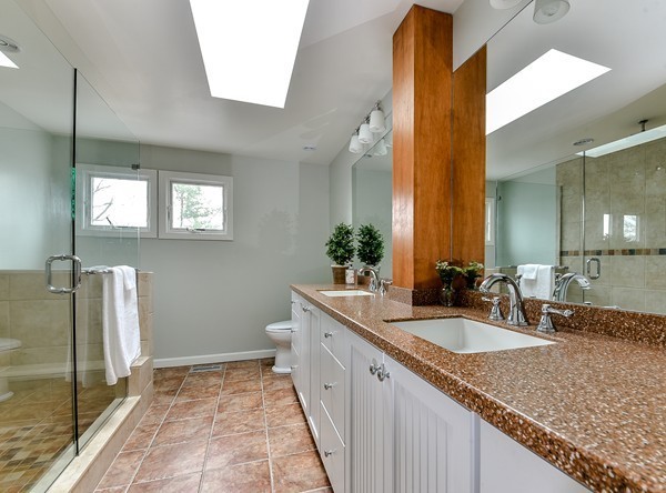 14 Farm Hill Road Natick, MA 01760 - Photo 15 of 27 a bathroom with a granite countertop sink and a mirror
