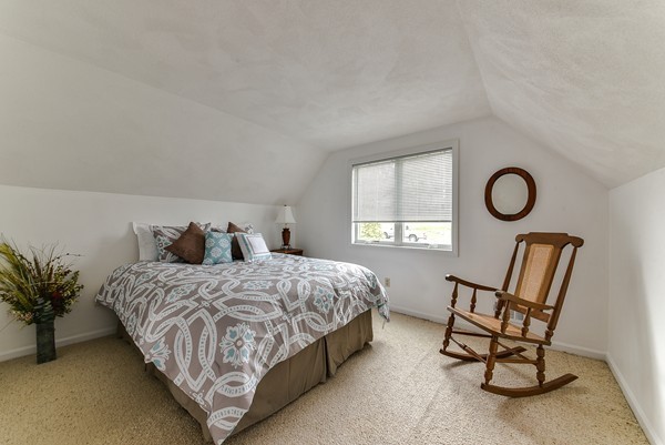 14 Farm Hill Road Natick, MA 01760 - Photo 17 of 27 a bedroom with a bed chair and window