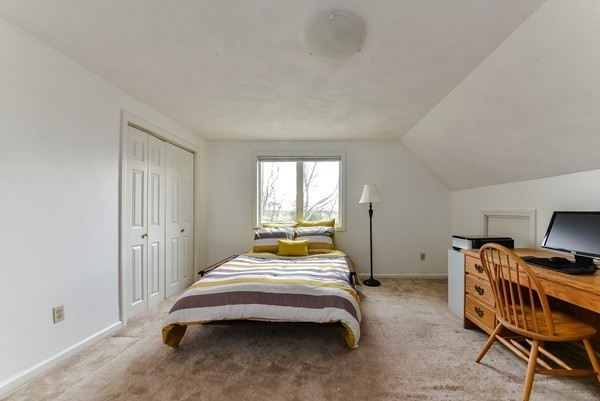 14 Farm Hill Road Natick, MA 01760 - Photo 19 of 27 a bedroom with bed and window