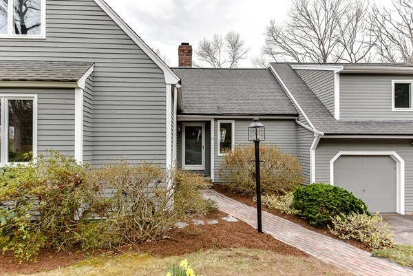 14 Farm Hill Road Natick, MA 01760 - Photo 2 of 27 a front view of a house with garden