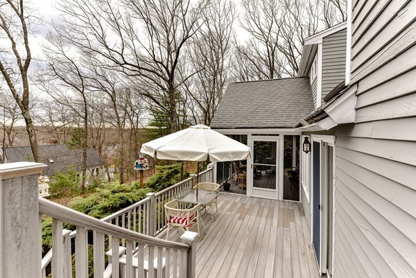 14 Farm Hill Road Natick, MA 01760 - Photo 23 of 27 a view of a roof deck with furniture and wooden deck
