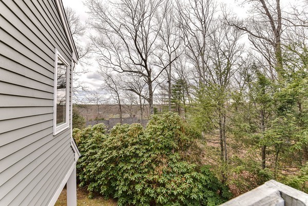 14 Farm Hill Road Natick, MA 01760 - Photo 26 of 27 a backyard of a house with lots of green space