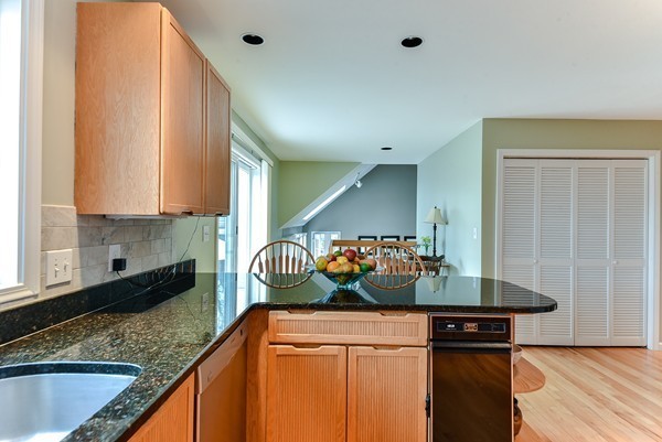 14 Farm Hill Road Natick, MA 01760 - Photo 9 of 27 a kitchen with stainless steel appliances granite countertop a sink and a cabinets