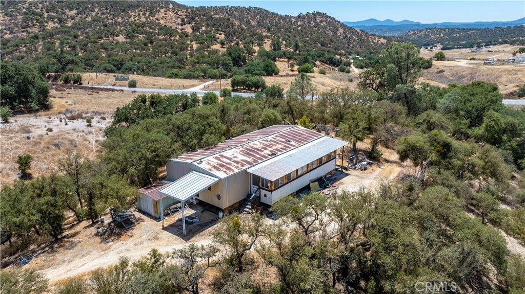 70229 Jolon Road Bradley, CA 93426 - Photo 12 of 14 an aerial view of a house with a yard and lake view