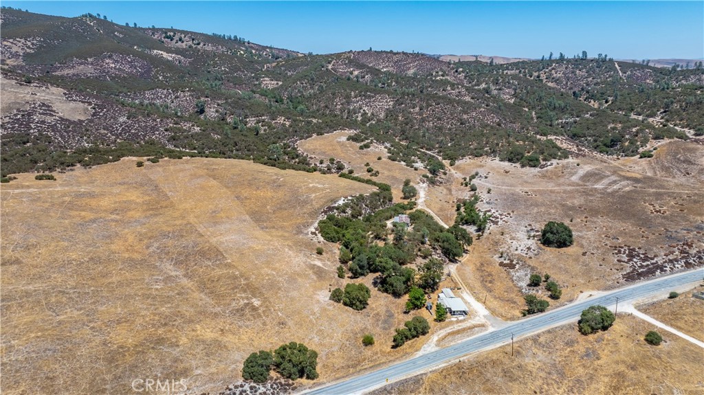 70229 Jolon Road Bradley, CA 93426 - Photo 13 of 14 a view of a yard with a mountain