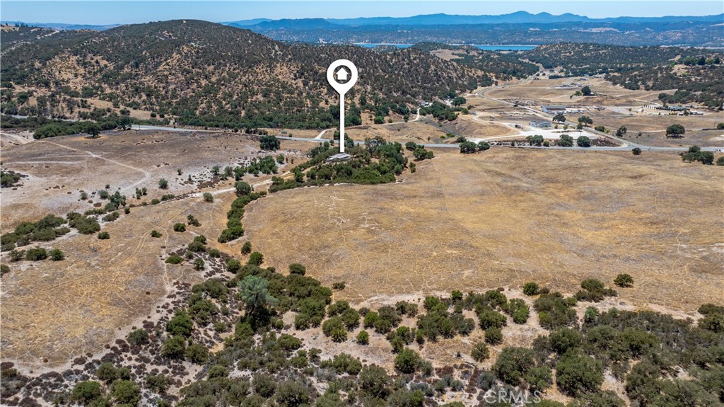 70229 Jolon Road Bradley, CA 93426 - Photo 5 of 14 an aerial view of a house with a yard and mountain view
