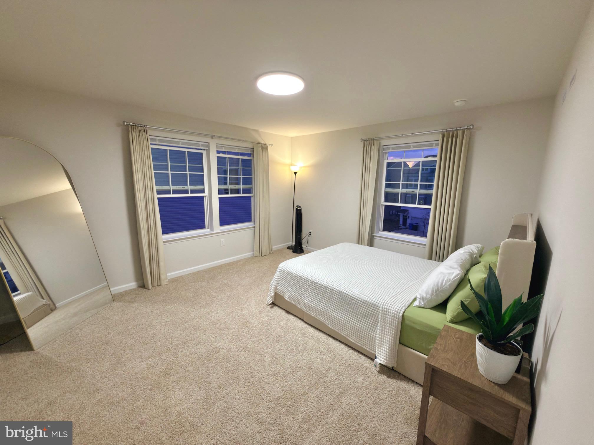 20 Stanton Rd Mount Mount Holly, NJ 08060 - Photo 14 of 25 a spacious bedroom with a bed and a couch