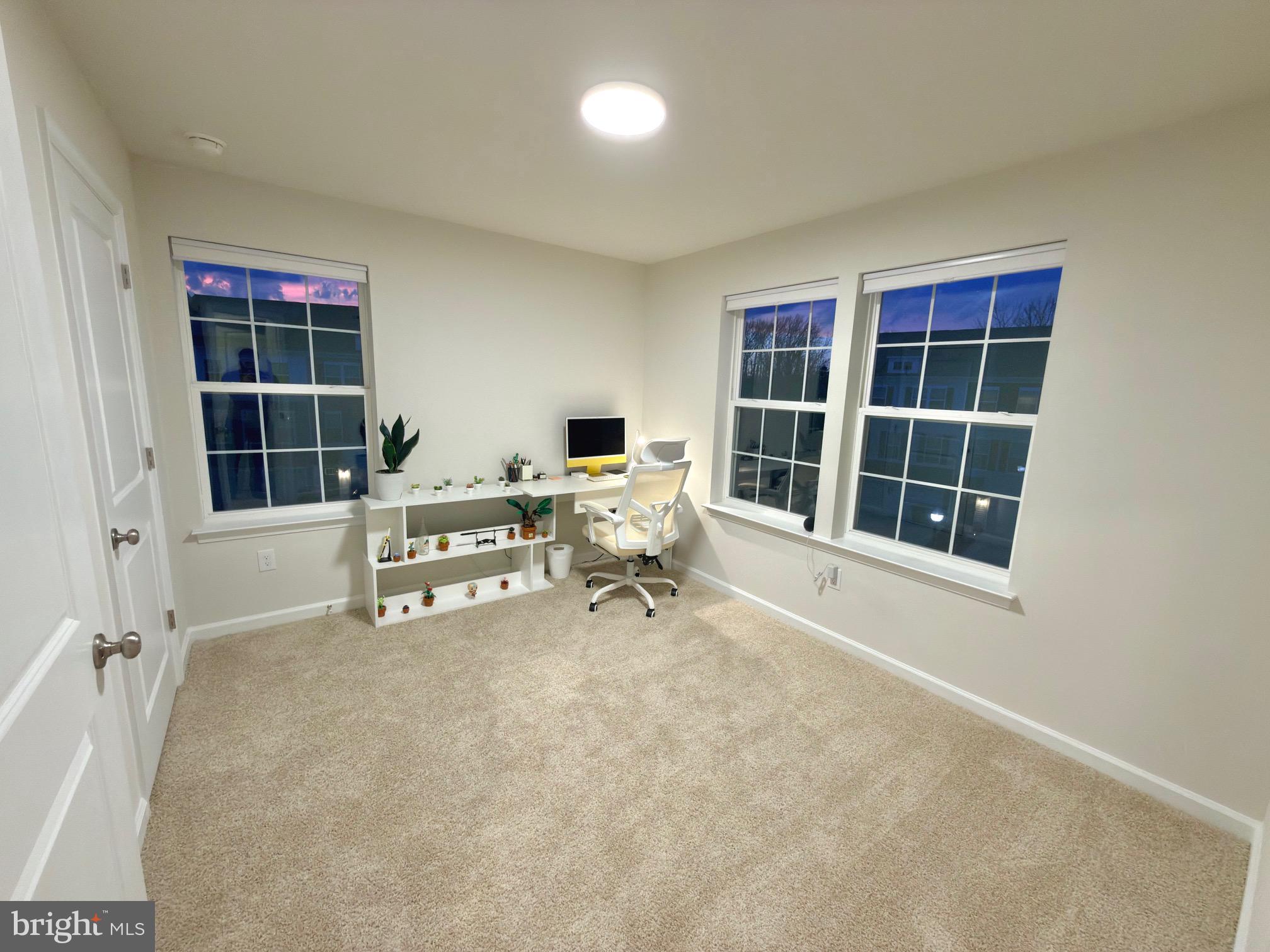 20 Stanton Rd Mount Mount Holly, NJ 08060 - Photo 21 of 25 a view of an empty room with a window and wooden floor
