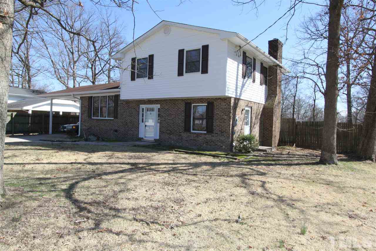 4120 Live Oak Road Raleigh, NC 27604 - Photo 3 of 25 a house that has a tree in front of it
