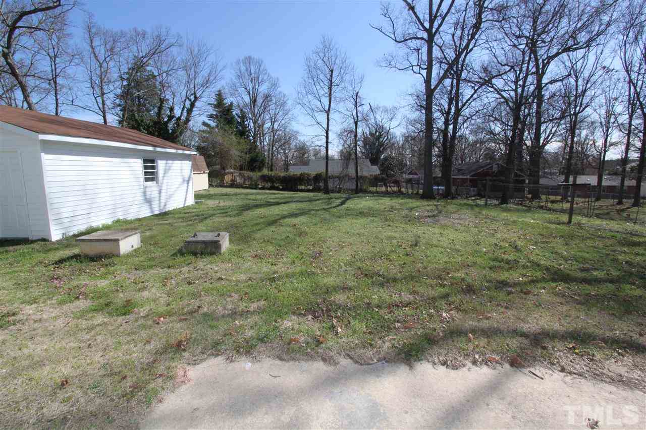4120 Live Oak Road Raleigh, NC 27604 - Photo 22 of 25 a view of a house with a backyard