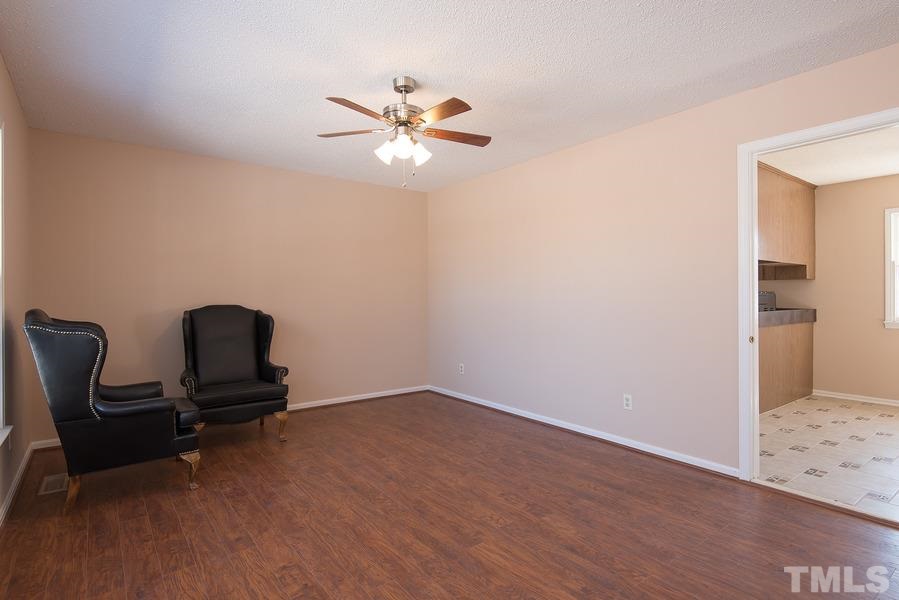 4120 Live Oak Road Raleigh, NC 27604 - Photo 5 of 25 a view of workspace with hardwood wall