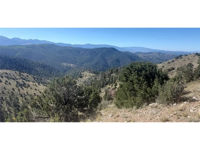 a view of a city with mountain in the background