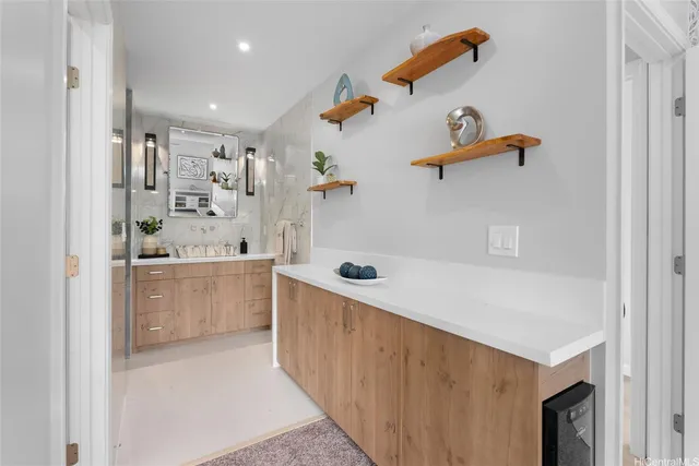 a bathroom with a bathtub and shower