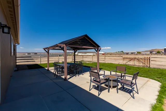 swimming pool view with a seating space