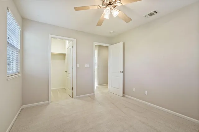 an empty room with a view of a room