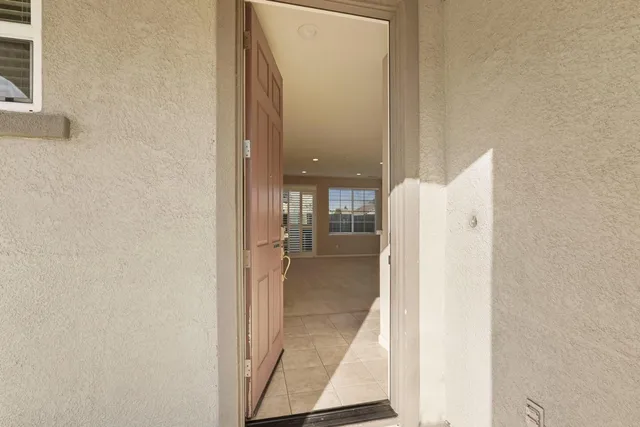 a view of a bathroom from a hallway