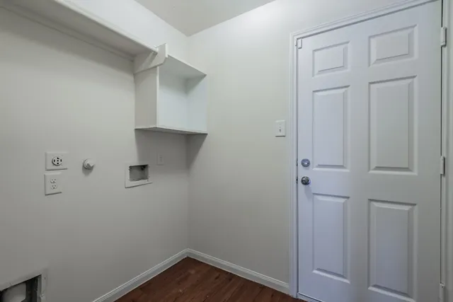 a view of small space with racks on the wall