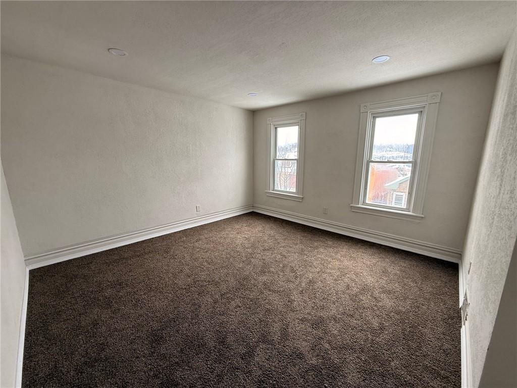 828 Frank Street McKees Rocks, PA 15136 - Photo 10 of 14 an empty room with windows