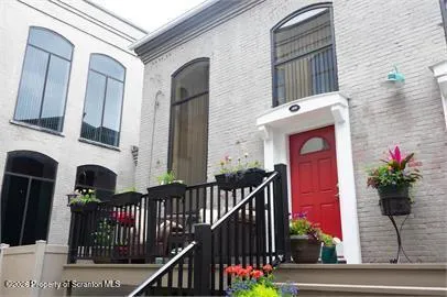 a front view of a house with an outdoor space
