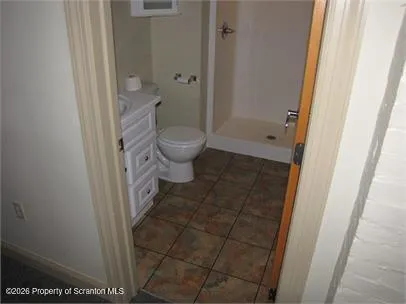 a bathroom with a sink and toilet