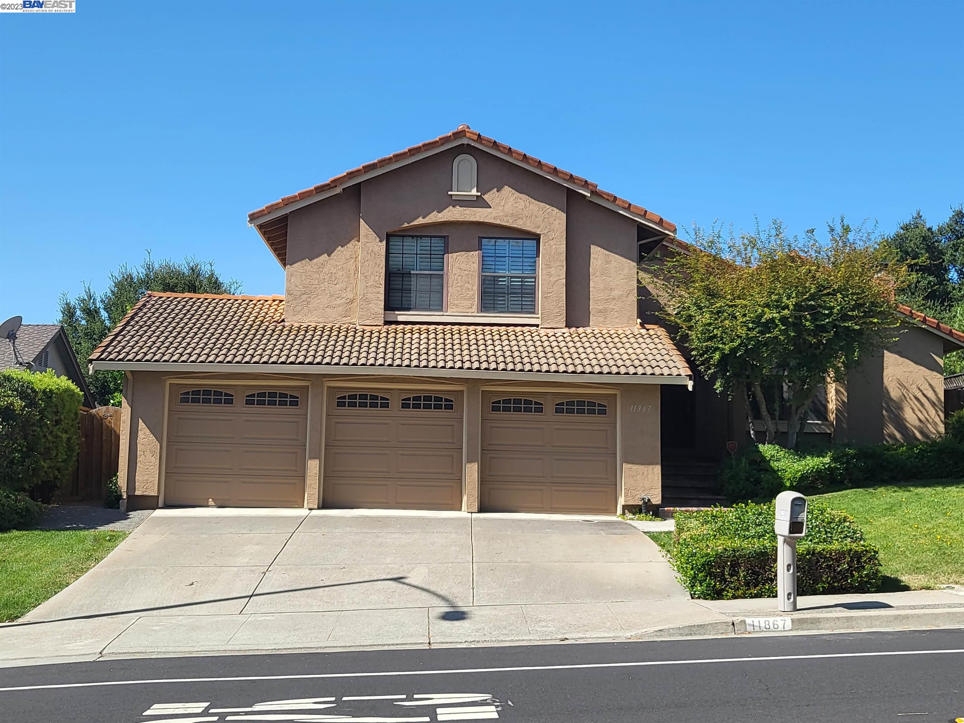 11867 West Vomac Road Dublin, CA 94568 - Photo 1 of 1 a front view of a house with a garden