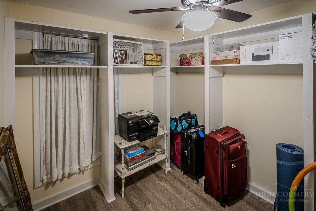 38 Rocky Meadows Road Newland, NC 28657 - Photo 22 of 50 a view of walk in closet with clothes and shoes