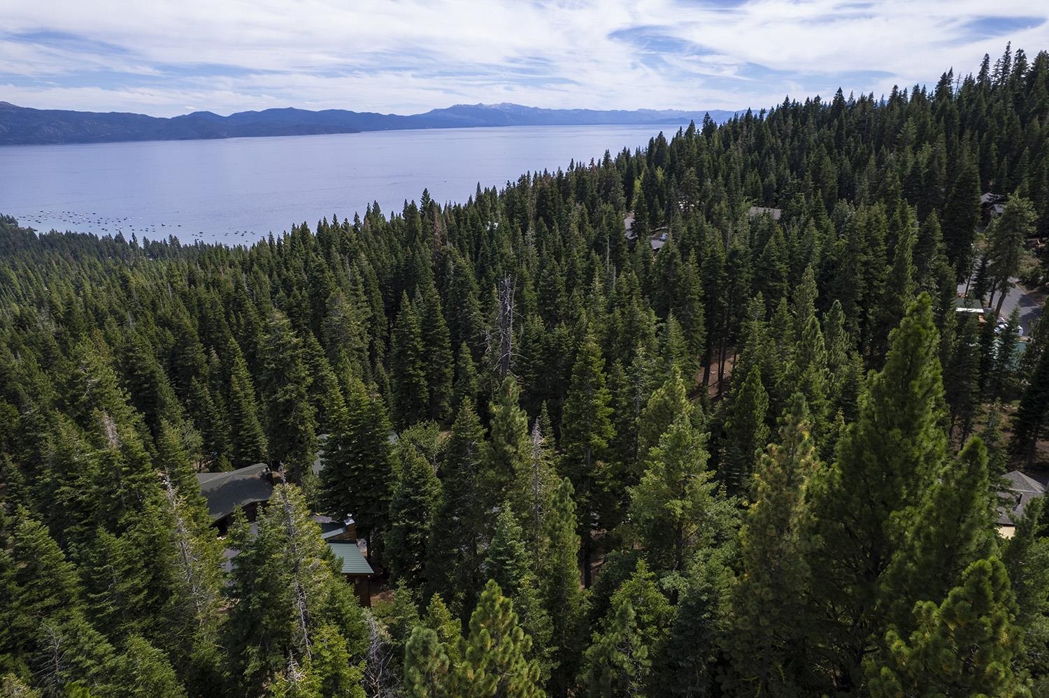 1359 Kings Way Tahoe Vista, CA 96148 - Photo 21 of 23 a view of a lake and green valley