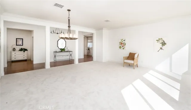 a kitchen with sink and cabinets