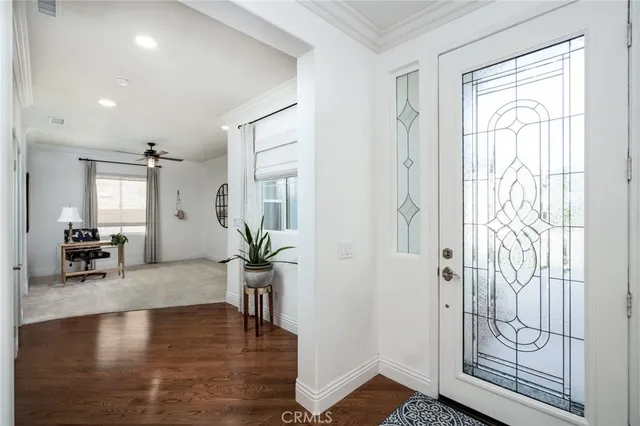 a view of livingroom with furniture and hardwood floor