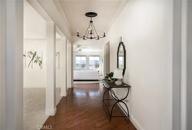 a view of a livingroom with furniture and wooden floor