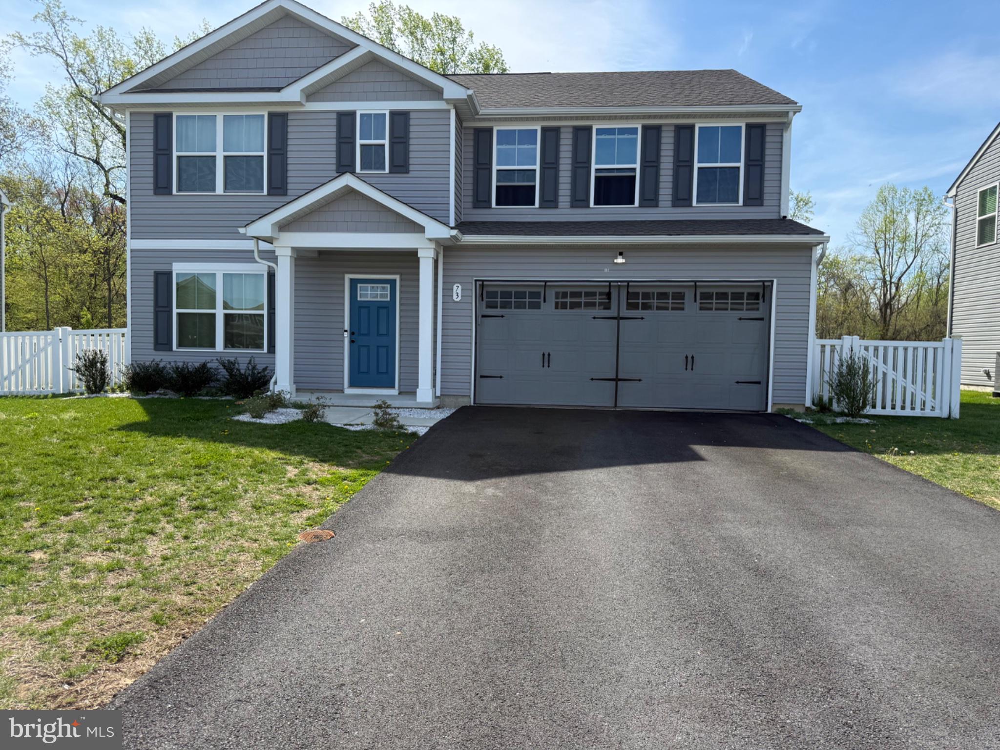 Charming home with inviting curb appeal.