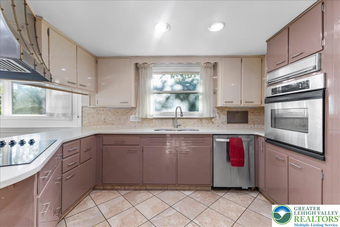 1331 Armstrong Road Bethlehem, PA 18017 - Photo 16 of 28 a kitchen with stainless steel appliances granite countertop a sink and cabinets