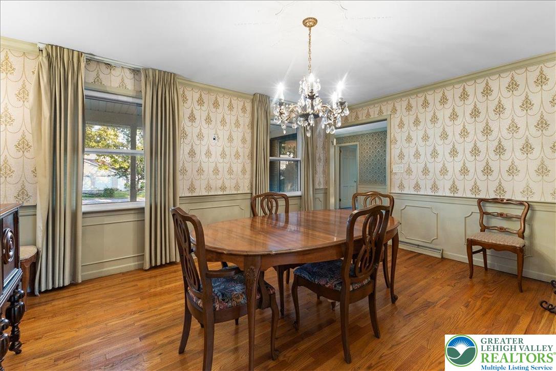 1331 Armstrong Road Bethlehem, PA 18017 - Photo 18 of 28 a view of a dining room with furniture window and wooden floor