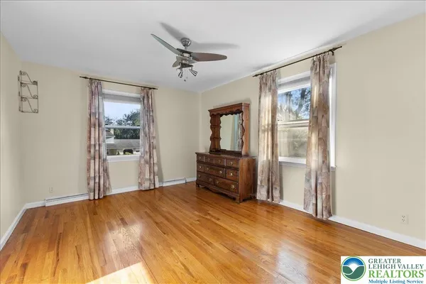 a view of a livingroom with wooden floor